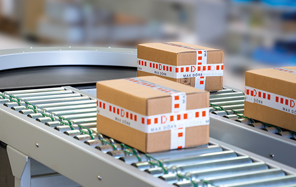 Cardboard box and container conveying technology